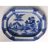 A Victorian blue & white printed earthenware chinoiserie meat dish decorated with a buffalo and