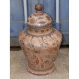 A large 19thC painted earthenware covered vase, 24” overall height – finial a/f.