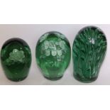 Three Victorian green glass dumpies – the largest 6”.