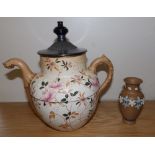 A Doulton Burslem Royles Patent self pouring teapot and a small Lambeth Silicon Ware vase. (2)