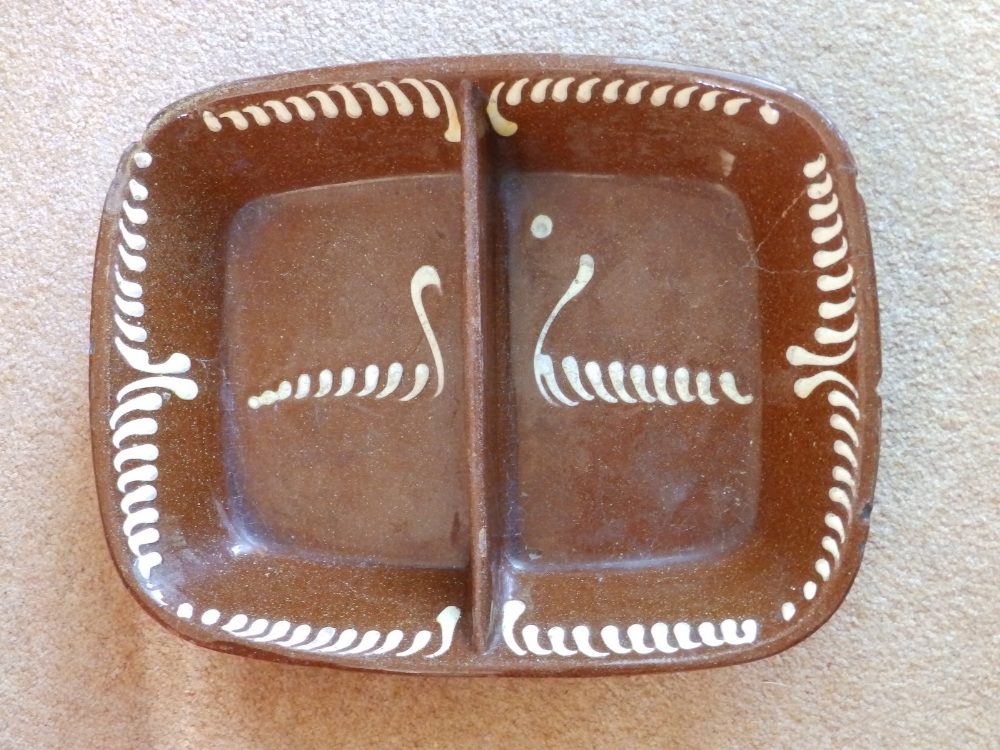 An old slipware double section rectangular dish – a/f.