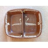 An old slipware double section rectangular dish – a/f.