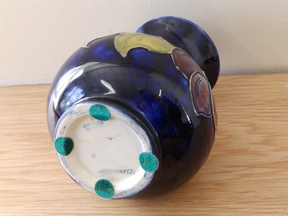 A Walter Moorcroft Clematis pattern dark blue vase. - Image 2 of 2