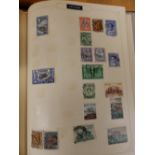 A collection of 20thC postage stamps including GB in albums.