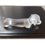 A Royal Leerdam frosted glass daschund paperweight designed by Lucienne Bloch, 4.75” across.
