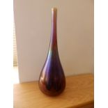 An iridescent glass bottle vase, 13.5” together with an Italian art glass vase, 5.5” (2)