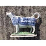 A 19thC blue & white printed cow creamer.