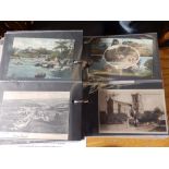 Approximately 200 Torbay postcards in a modern album.