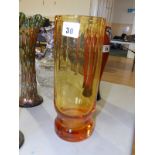 A Victorian amber cut glass celery vase.