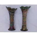 A pair of green carnival glass vases, 10” high.