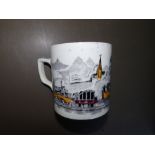 A Victorian mug decorated with a steam train – cracked.