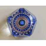 A faceted QEII Coronation millefiori weight - 'EIIR 1953', 2.75” diameter.