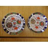 Two matching Royal Crown Derby Japan pattern plates.