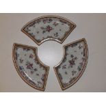 A Chinese famille rose porcelain three piece part supper set, comprising three curved dishes