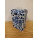 A 19thC blue & white delft armorial caddy, 4.5” high.