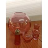 A Bohemian glass vase, a Victorian cranberry caster and two bowls. (4)