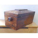 A Regency mahogany sarcophagus tea caddy.