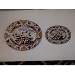 A Victorian Ashworth's Ironstone meat dish and matching drainer. (2)