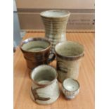 Two Leach Pottery 'cups', two others and a Peter Curtis vase. (5)