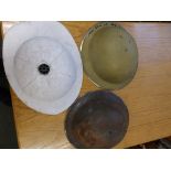 A pith helmet and two others. (3)