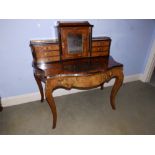 A 19thC walnut marquetry bonheur du jour having ormolu mounts and galleries, a central mirrored