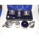 A cased three piece silver condiment set – JR, Birmingham 1902 and four other condiment pieces. (7)