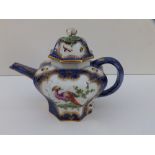A Worcester style small porcelain teapot decorated exotic birds with scale blue ground – fretted