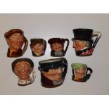 Seven small Royal Doulton character jugs.