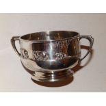 A Mappin & Webb silver two-handled bowl with cast decoration of three bears - Sheffield 1934, 5.5”