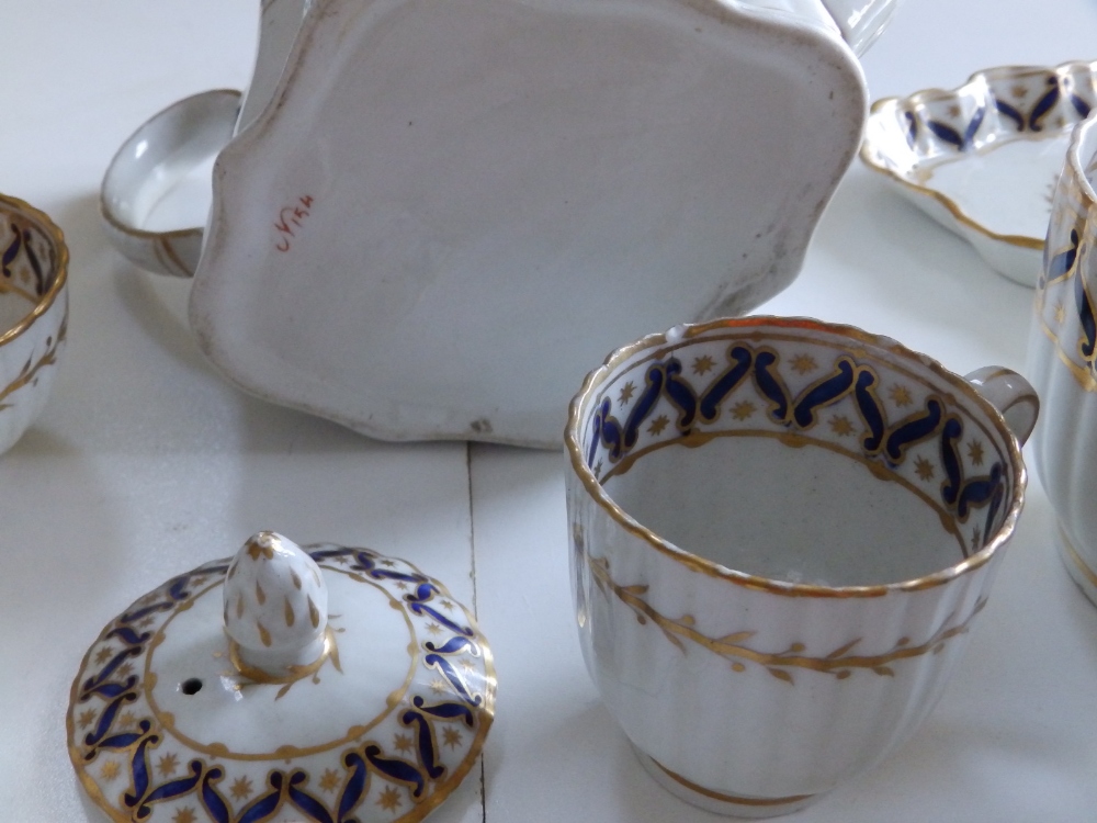 A 16 piece New Hall fluted porcelain tea set including teapot, decorated in dark blue & gold pattern - Image 2 of 2