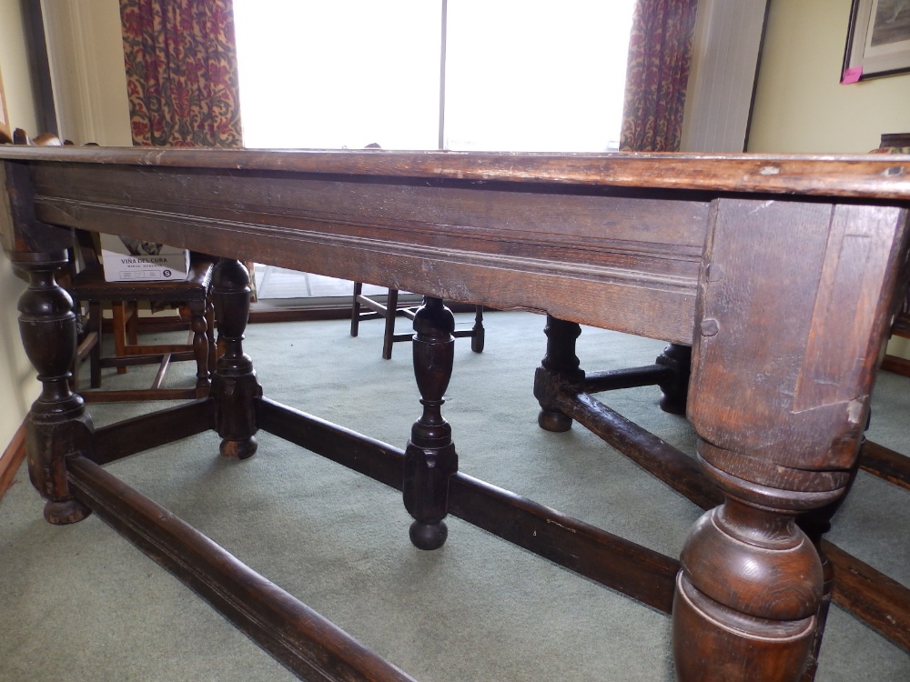 An oak side table with carved frieze, standing on six legs united by low stretchers, Height 32”, - Image 3 of 4