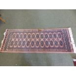 A 20thC Afghan rug – 3'10” x 2'8” and another smaller rug. (2)