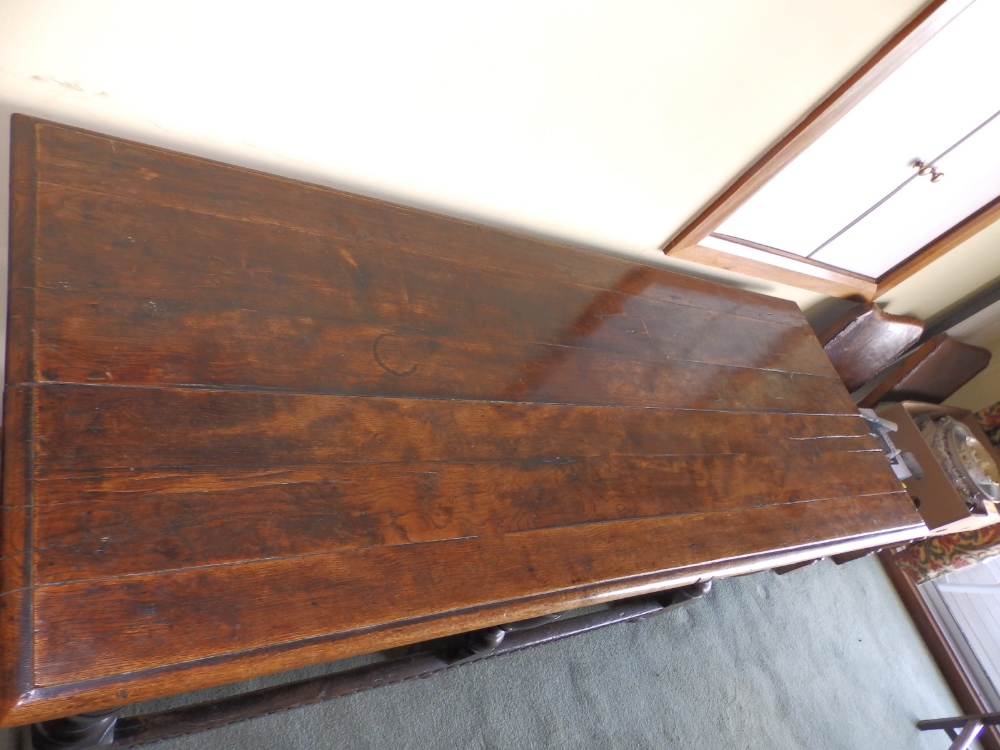 An oak side table with carved frieze, standing on six legs united by low stretchers, Height 32”, - Image 2 of 4