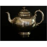 A Victorian silver circular teapot retailed by Harrods – RG, London 1871, 9.5” across handle.