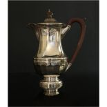 A silver hot water jug – S&B, Birmingham 1929, 8.5” high.