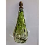 A signed Venetian green glass table lamp of wrythen form, 14” overall.