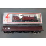 A boxed Lima 0 Scale LMS 4683 tank locomotive and tender and a Lima 0 Scale W99203 coach