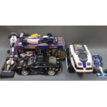 A group of remote control and model racing cars, to include a boxed 1:16 scale Ford Focus,