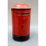 A Burnett Limited novelty money bank, in the form of a post box,