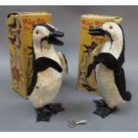 2 wind up Polar Pete the Fairylite penguins, having plastic beaks and feet,