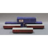 A group of 3 boxed Hornby Dublo 00 gauge coaches, to include a guard coach,