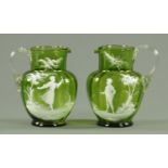 A pair of Mary Gregory style jugs, late 19th century,