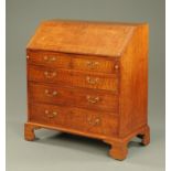 A George III plum pudding mahogany bureau,