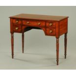 A 19th century mahogany kneehole dressing table,