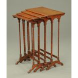 A quartetto of boxwood strung mahogany occasional tables, with ring turned legs. Width 50 cm.