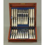 A canteen of fruit knives and forks, late 19th century, twelve plate settings,