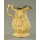 A relief moulded buff ground jug, 19th century,