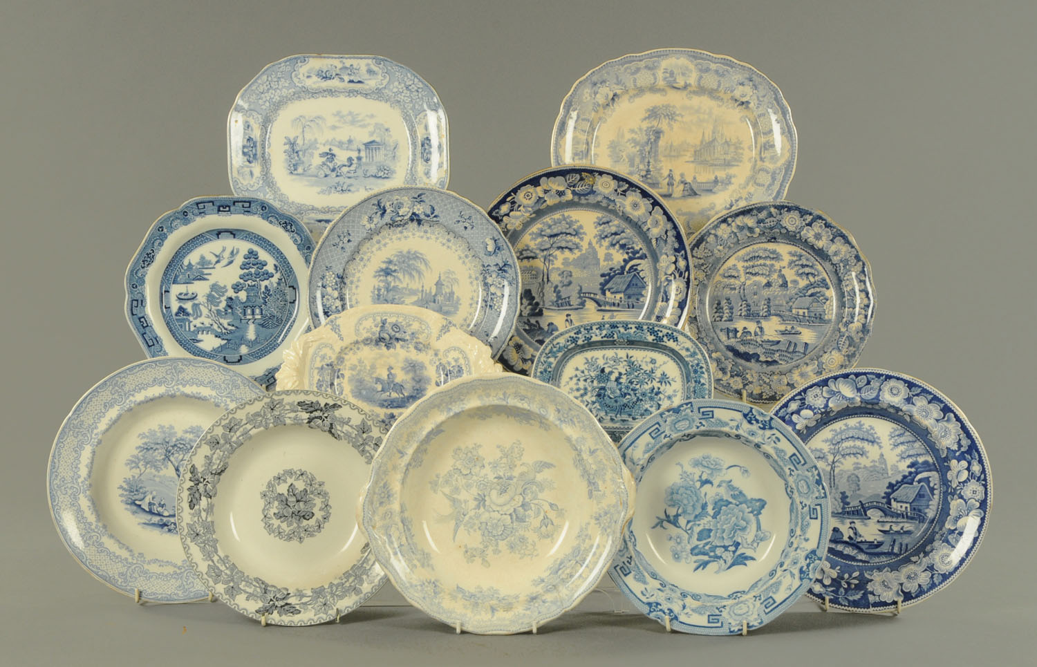 A collection of blue and white transfer printed earthenware tableware, early to late 19th century,