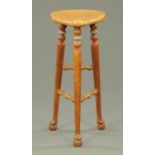 An oak bar stool,