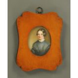 A half length portrait miniature on porcelain panel, mid 19th century, young lady,